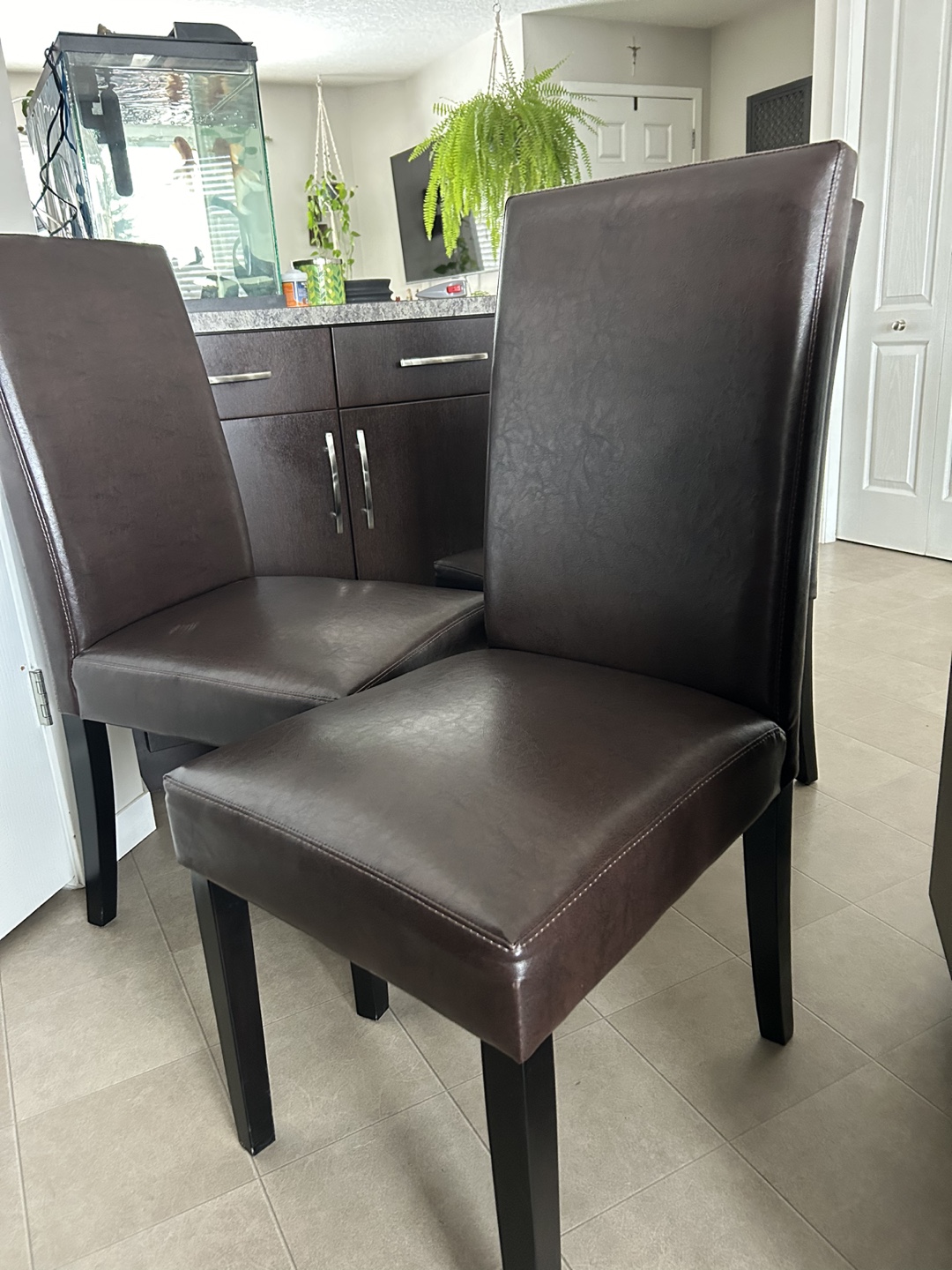4 Clean & solid kitchen chairs (covers optional)