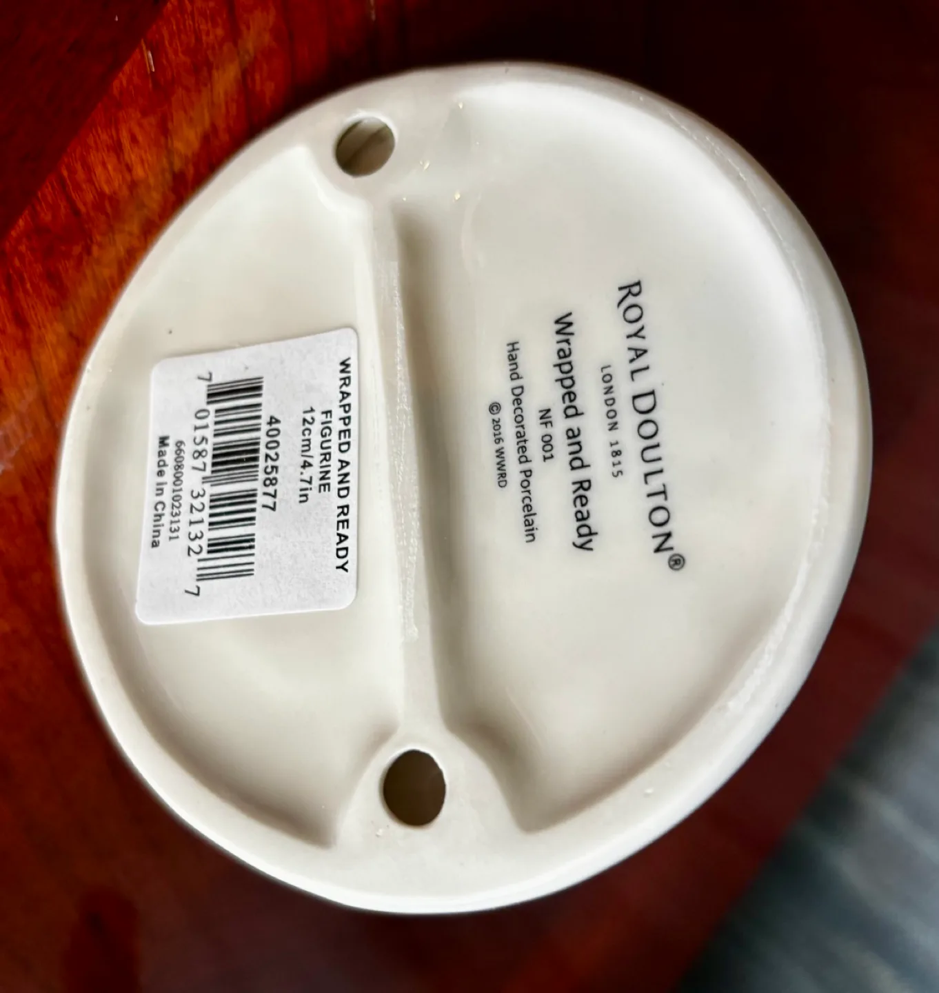 Royal Doulton 'Wrapped and Ready' Figurine image indicator(4)