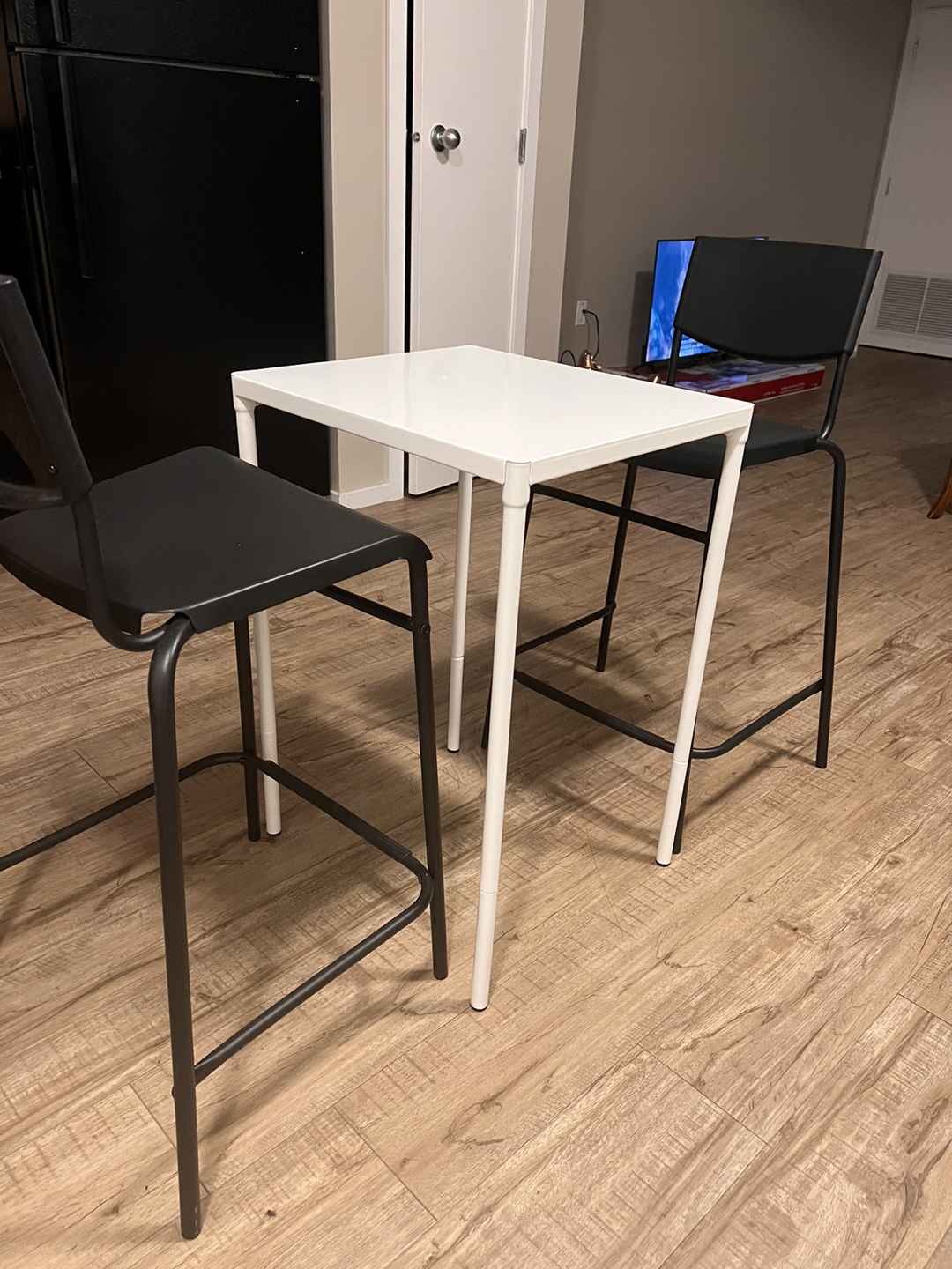 IKEA White Table and 2 Black Chairs