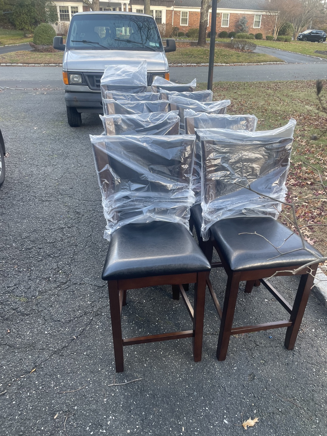 Brand new chair in dark color wood vinyl dark brown