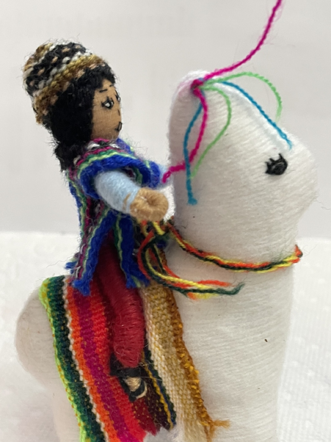 Peruvian Llama and Person Figurine