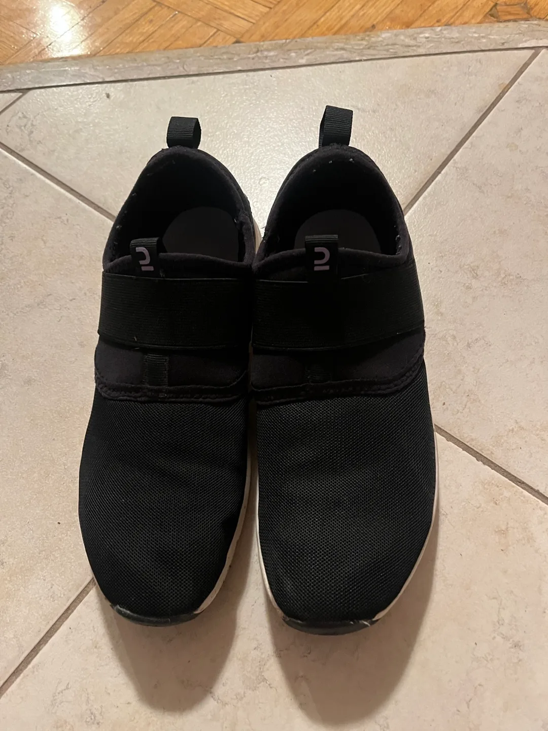 Black slip-on running shoes thumbnail