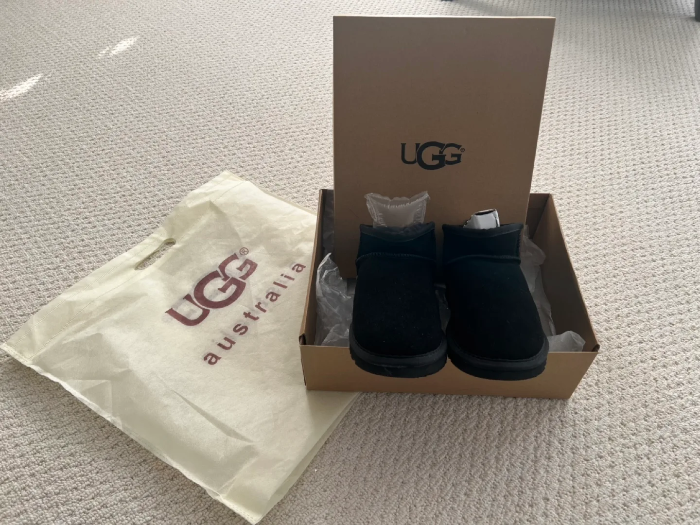 UGG Black Mini Ugg Boots image indicator(2)