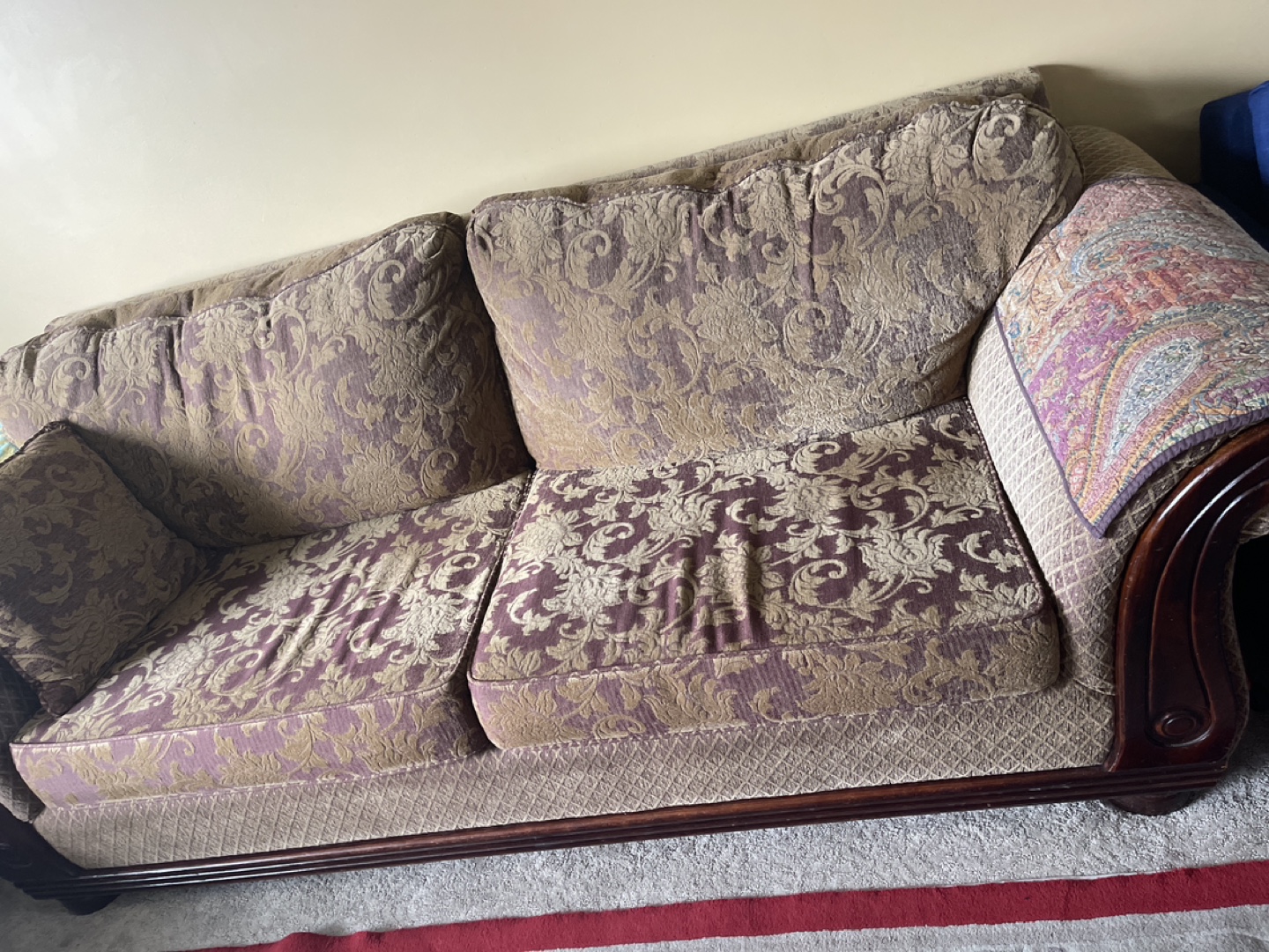 Loveseat with floral upholstery