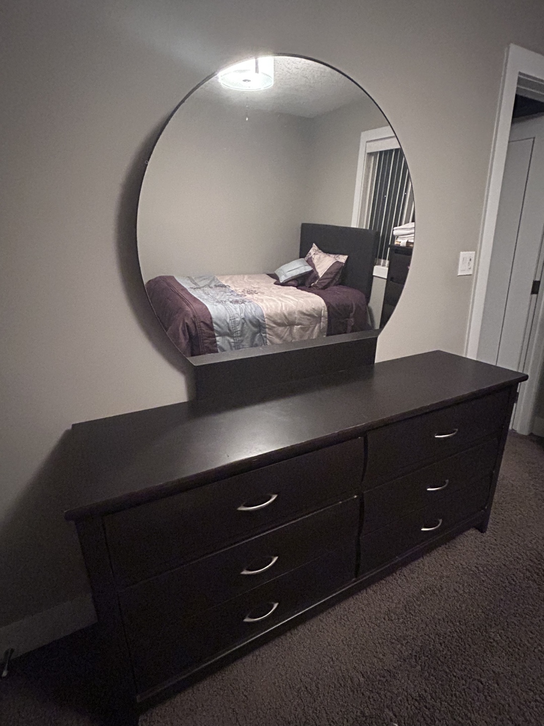 Dark brown dresser with mirror