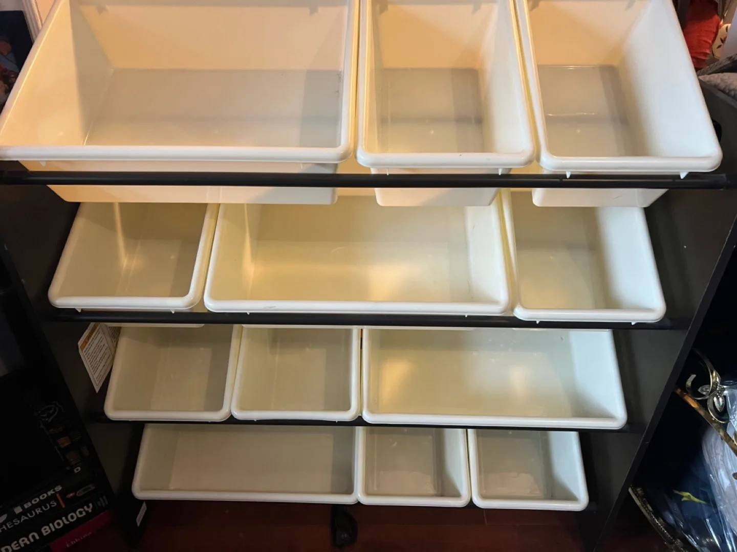 Black Storage Unit With White Bins image indicator(3)