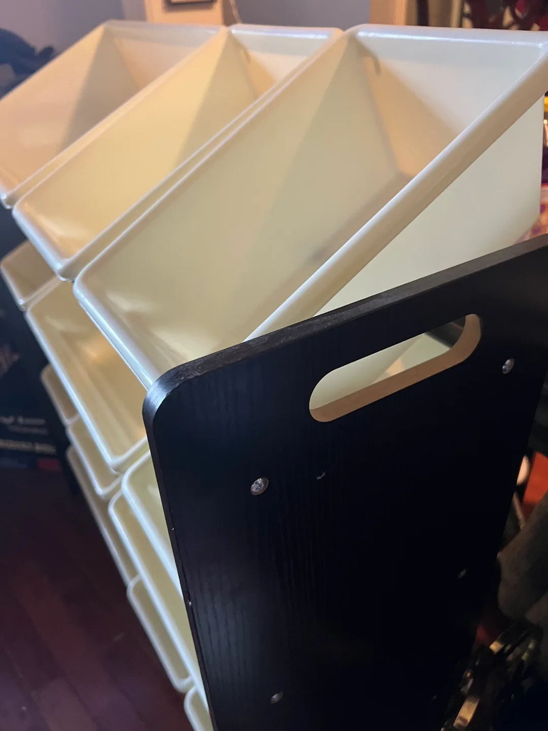 Black Storage Unit With White Bins image indicator(4)