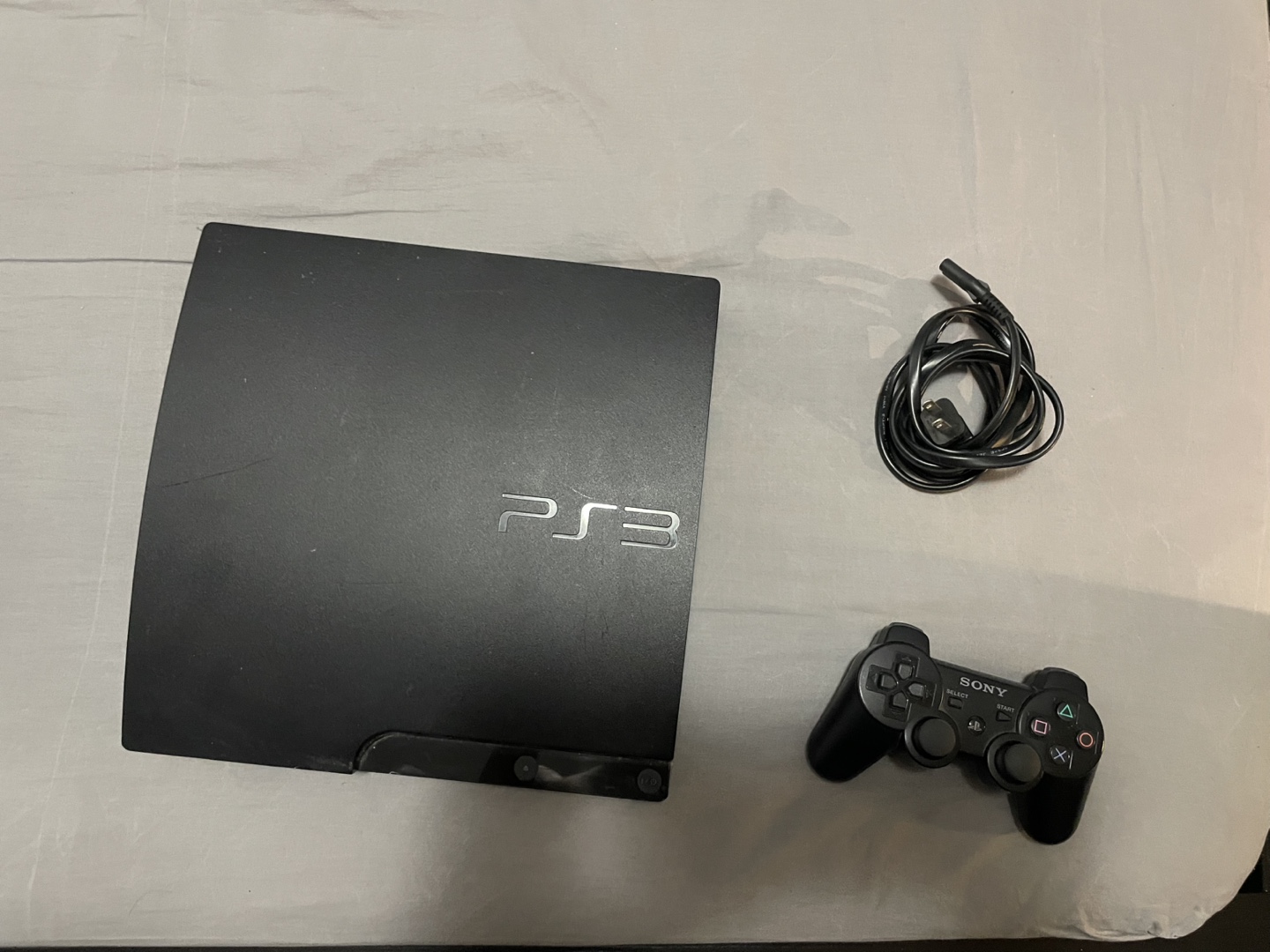 PS3 Slim with Controller +6 games (in description)