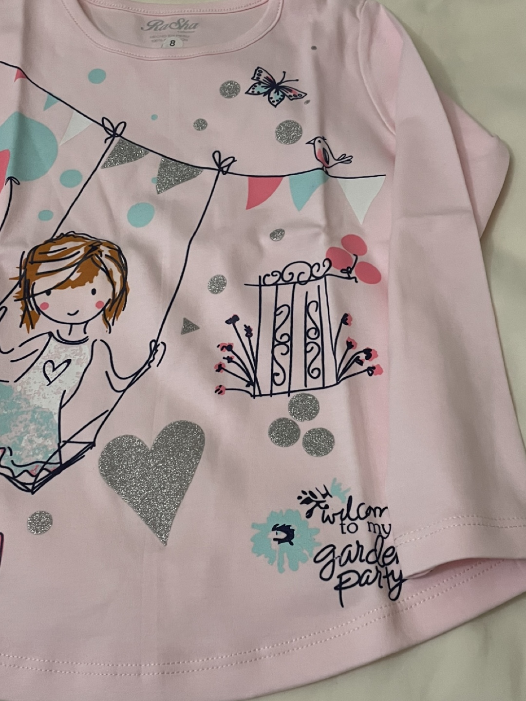 Pink long sleeve shirt with glitter details