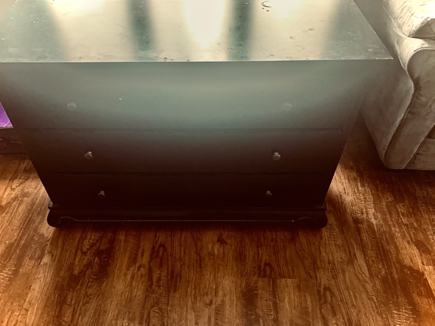 Black wooden dresser with three drawers