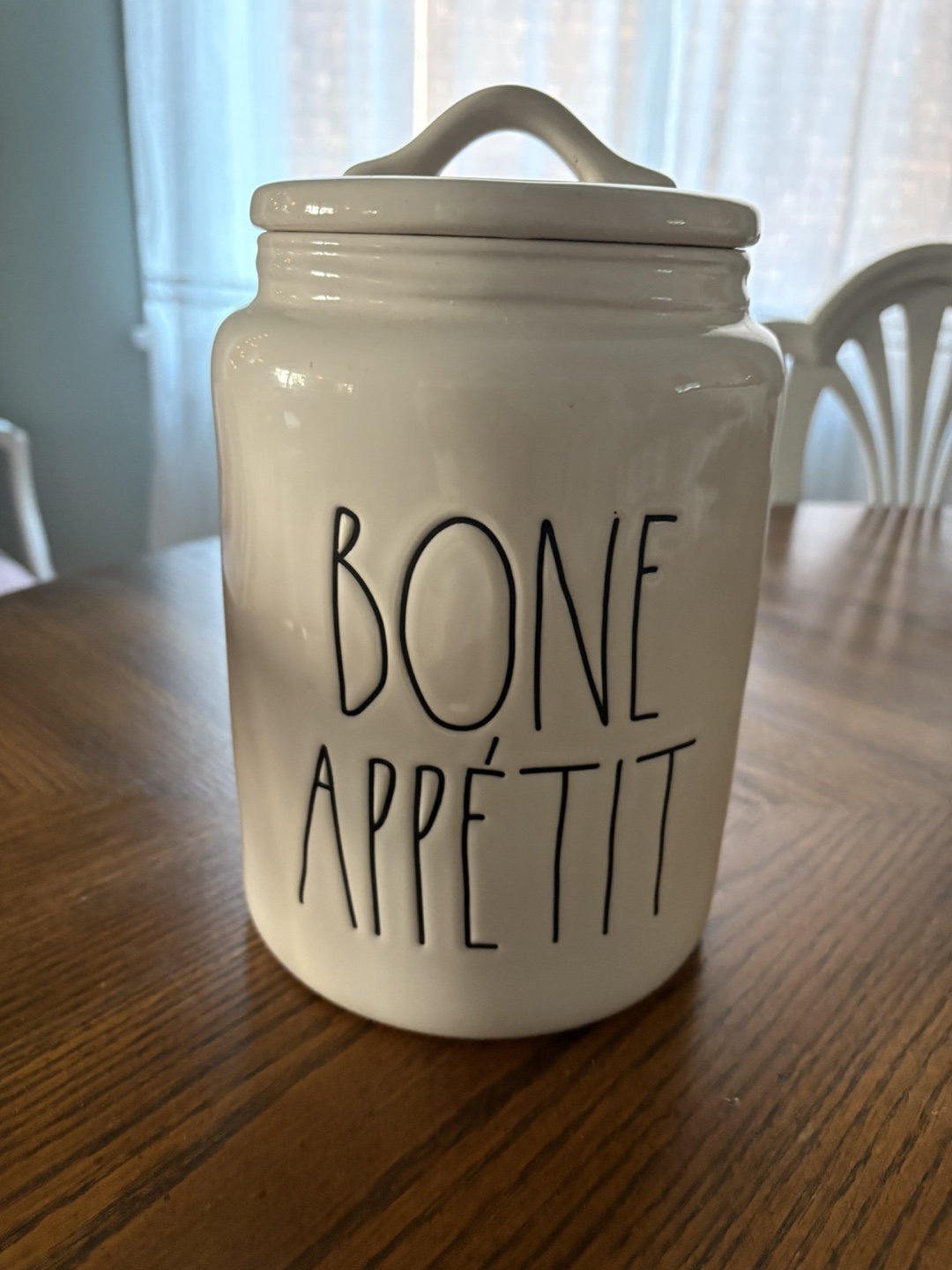 CLAIMED.   White Ceramic 'Bone Appétit' Jar