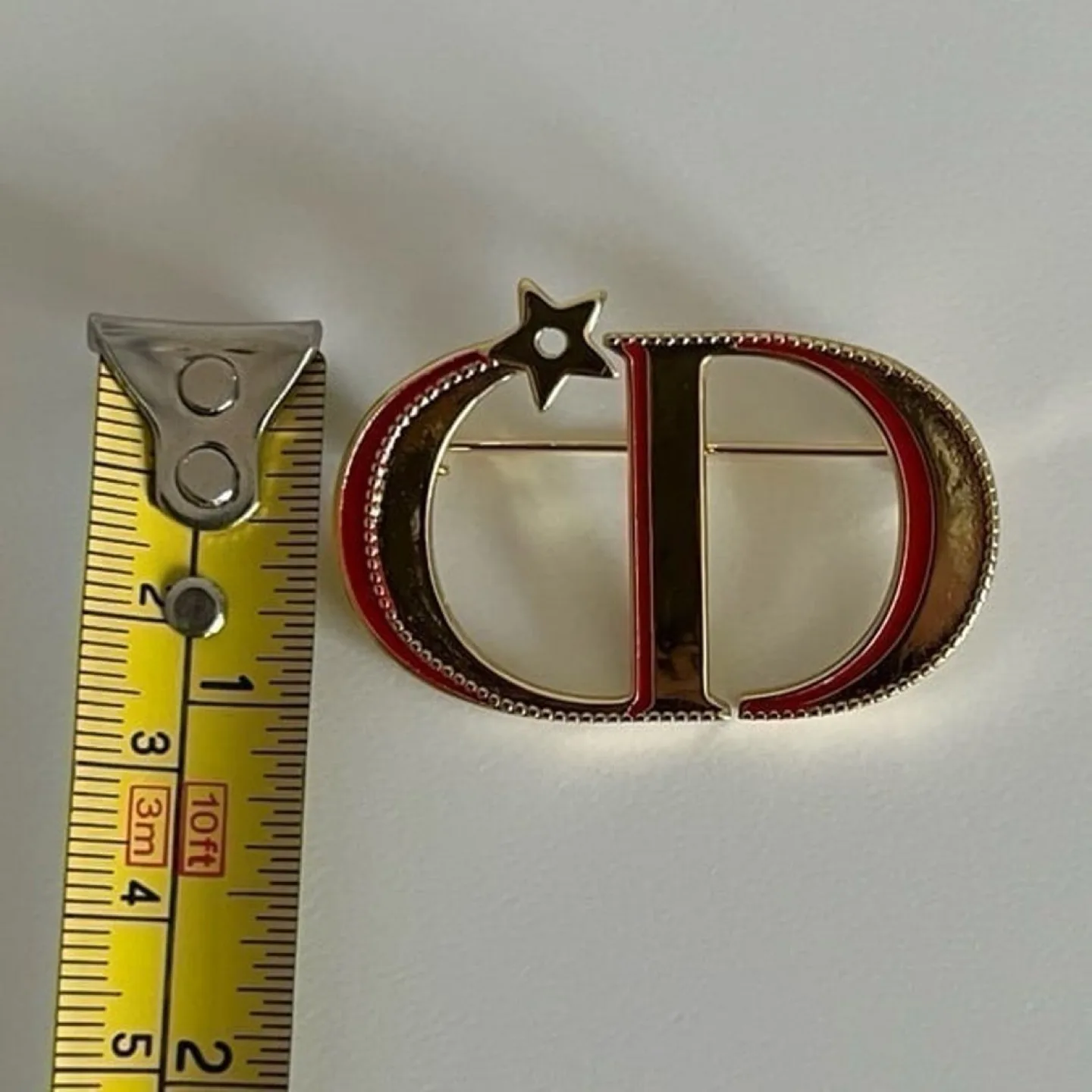 Christian Dior CD Logo Unisex Luxury Brooch image indicator(6)