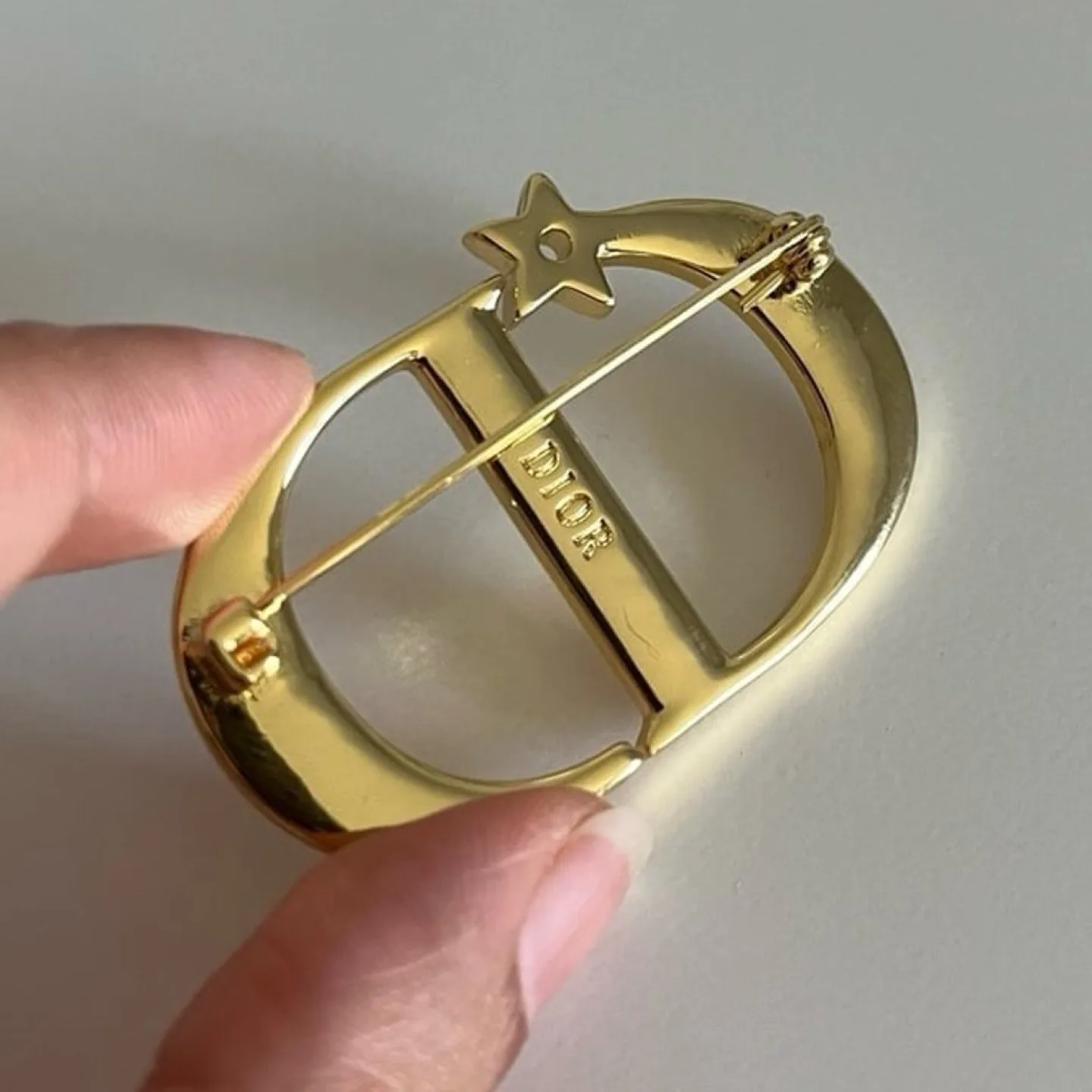 Christian Dior CD Logo Unisex Luxury Brooch image indicator(4)