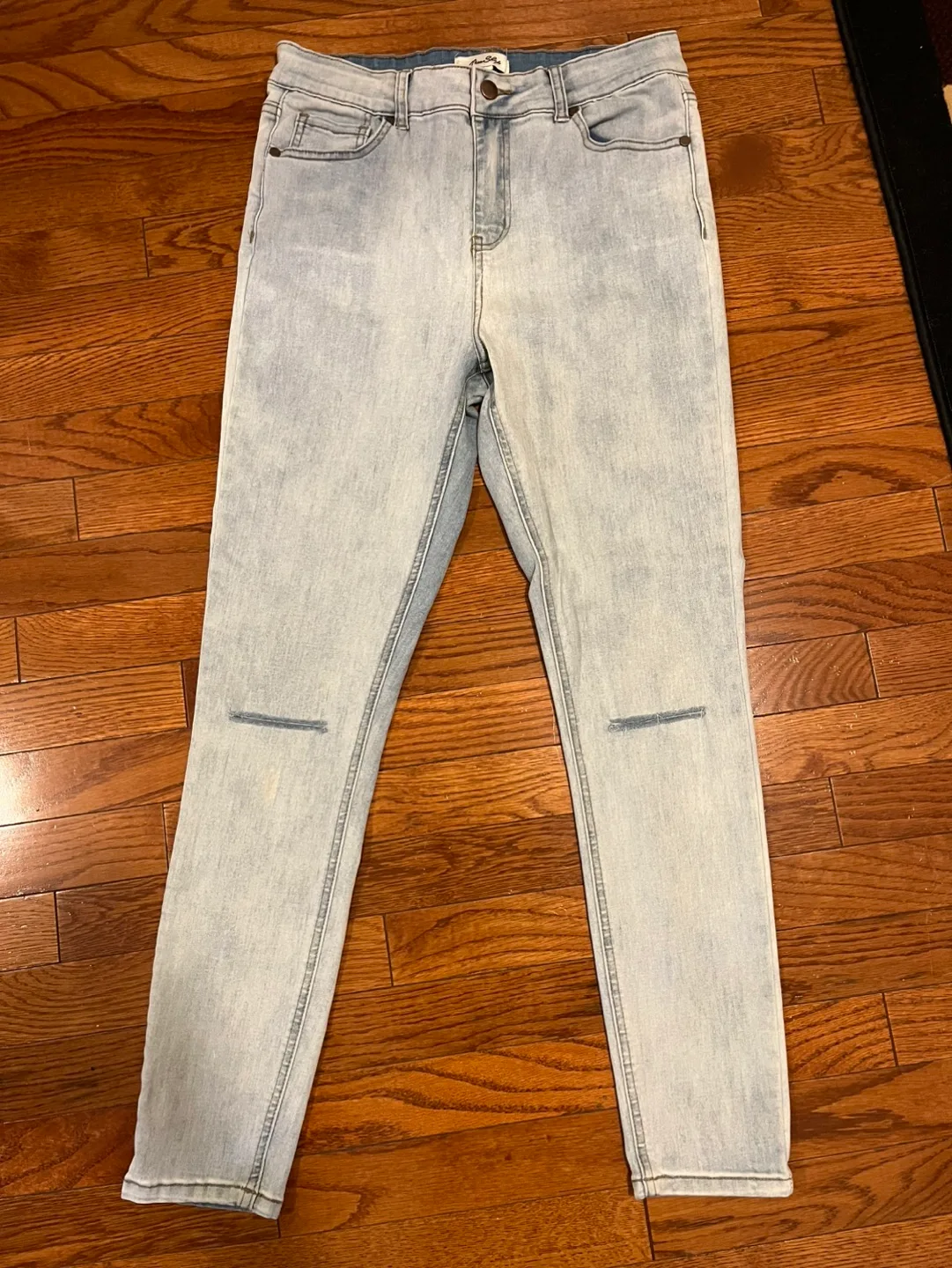 Women’s Jeans, size 12 (29), light wash, knee cut thumbnail
