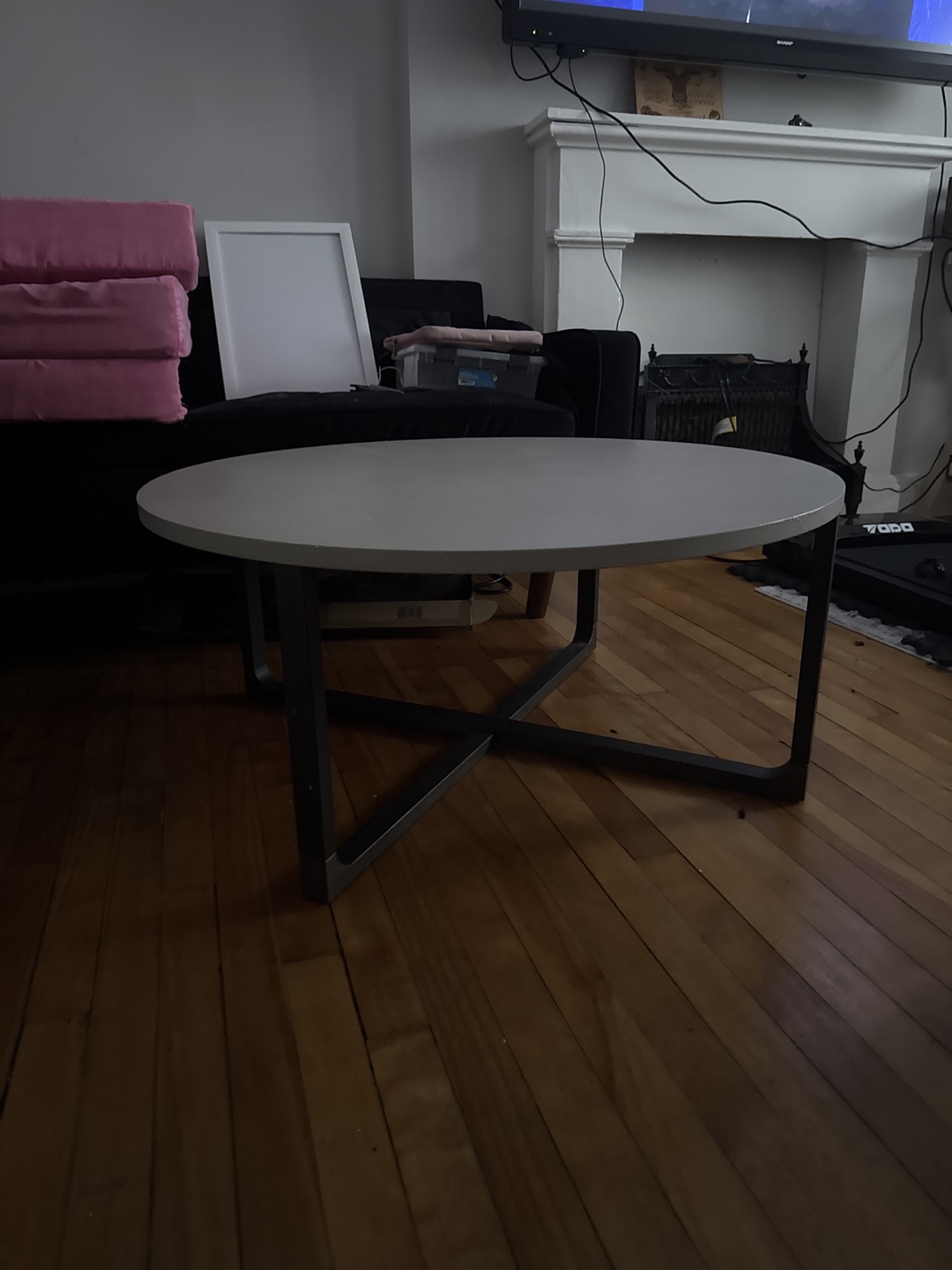 Round Coffee Table with Black X-Base