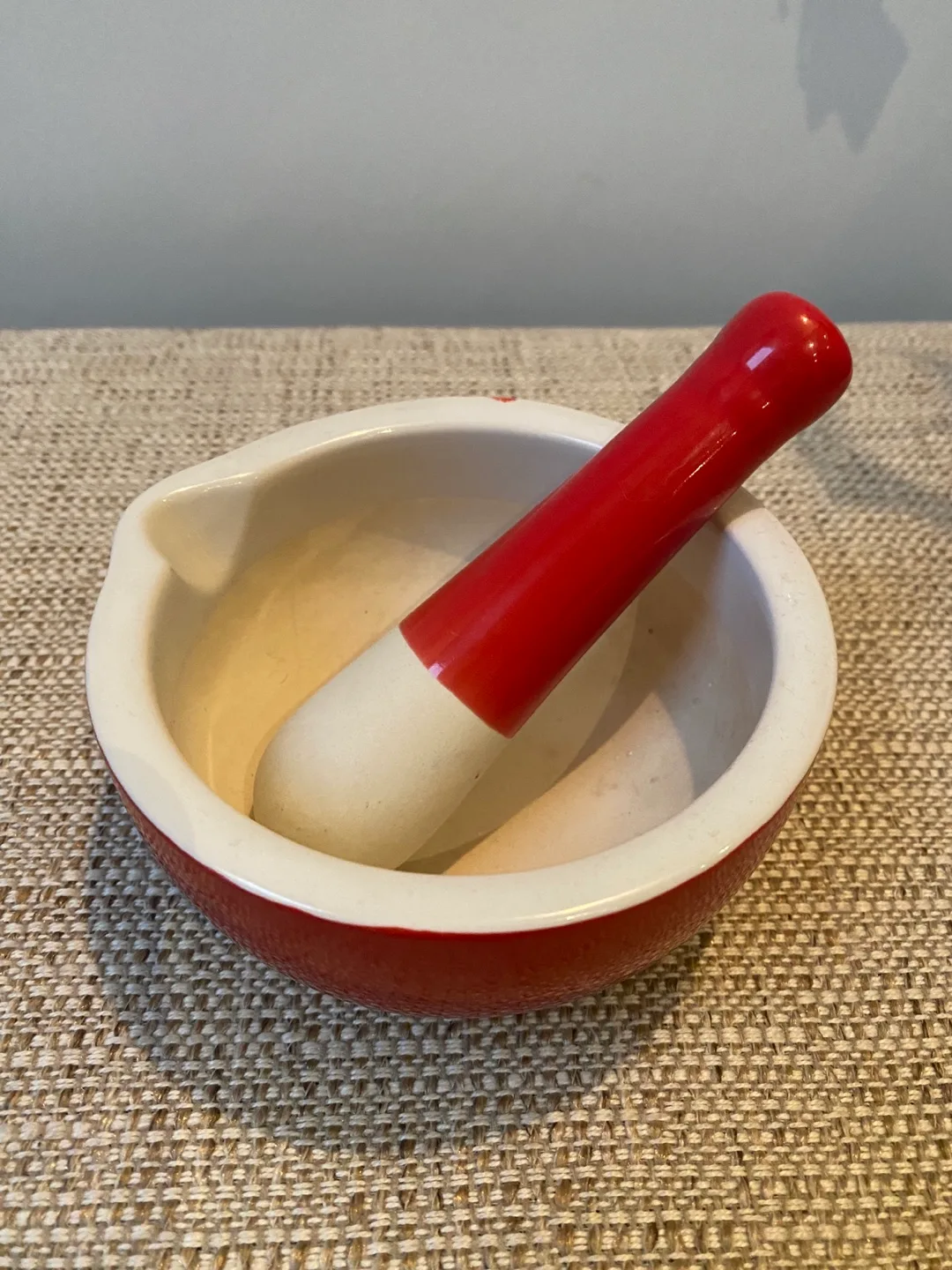 Red and White Ceramic Mortar and Pestle thumbnail