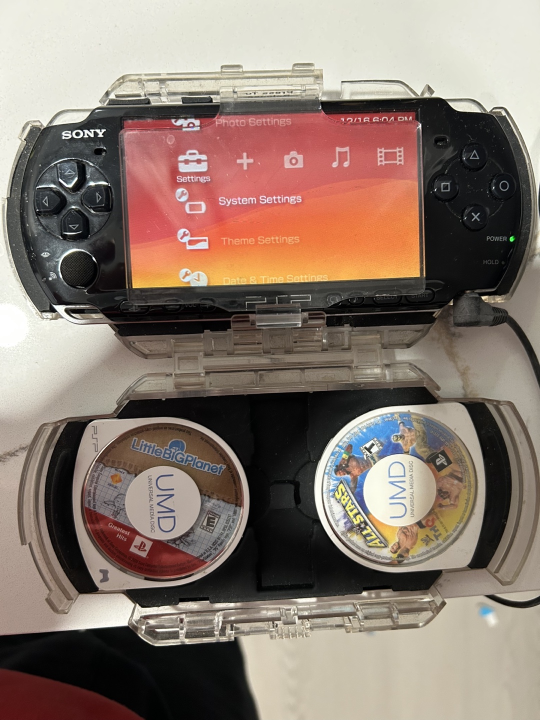 Sony PlayStation Portable Slim & Lite (PSP-3000) with games - photo 4