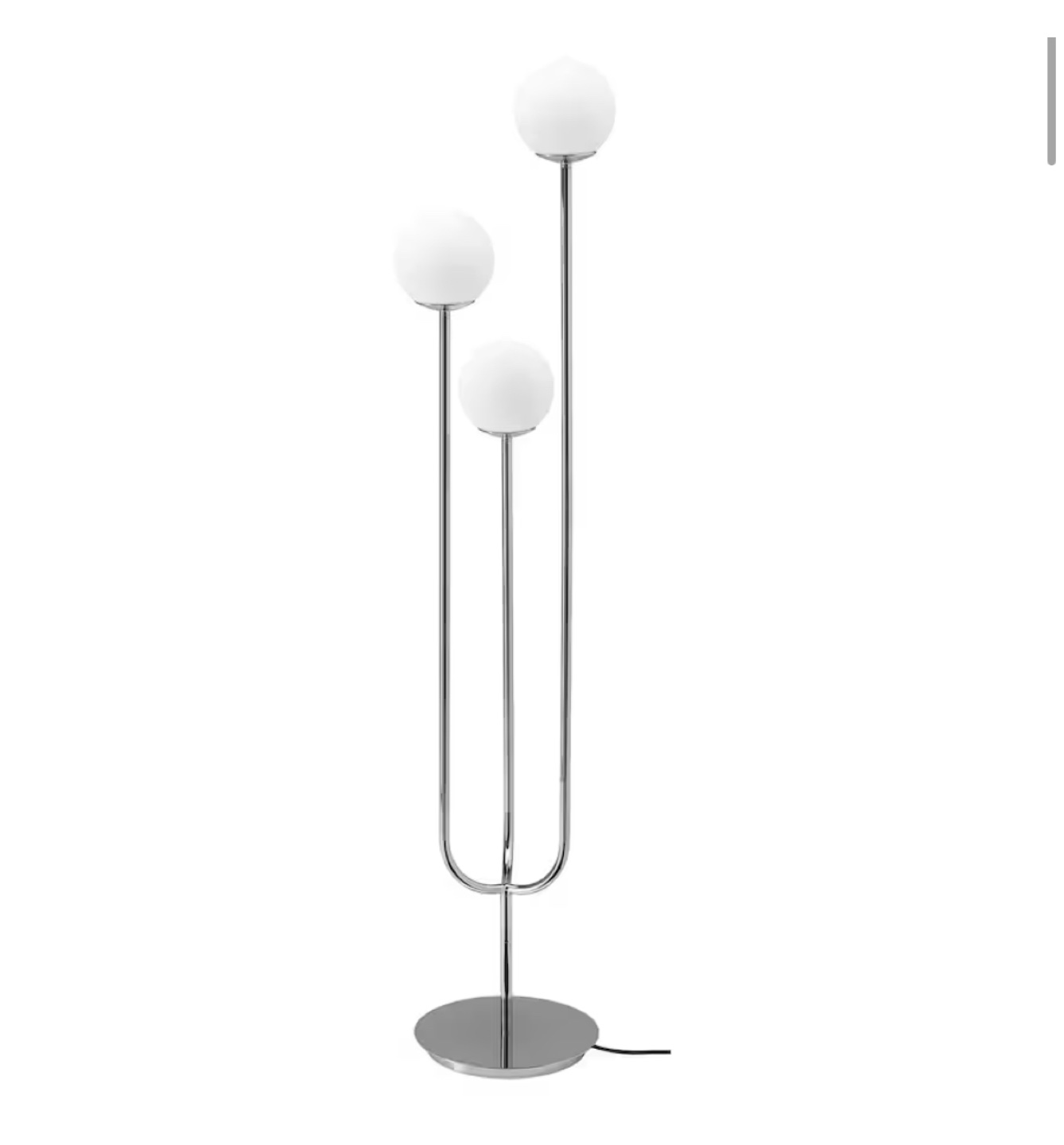 Chrome floor lamp with three white globe light fixtures