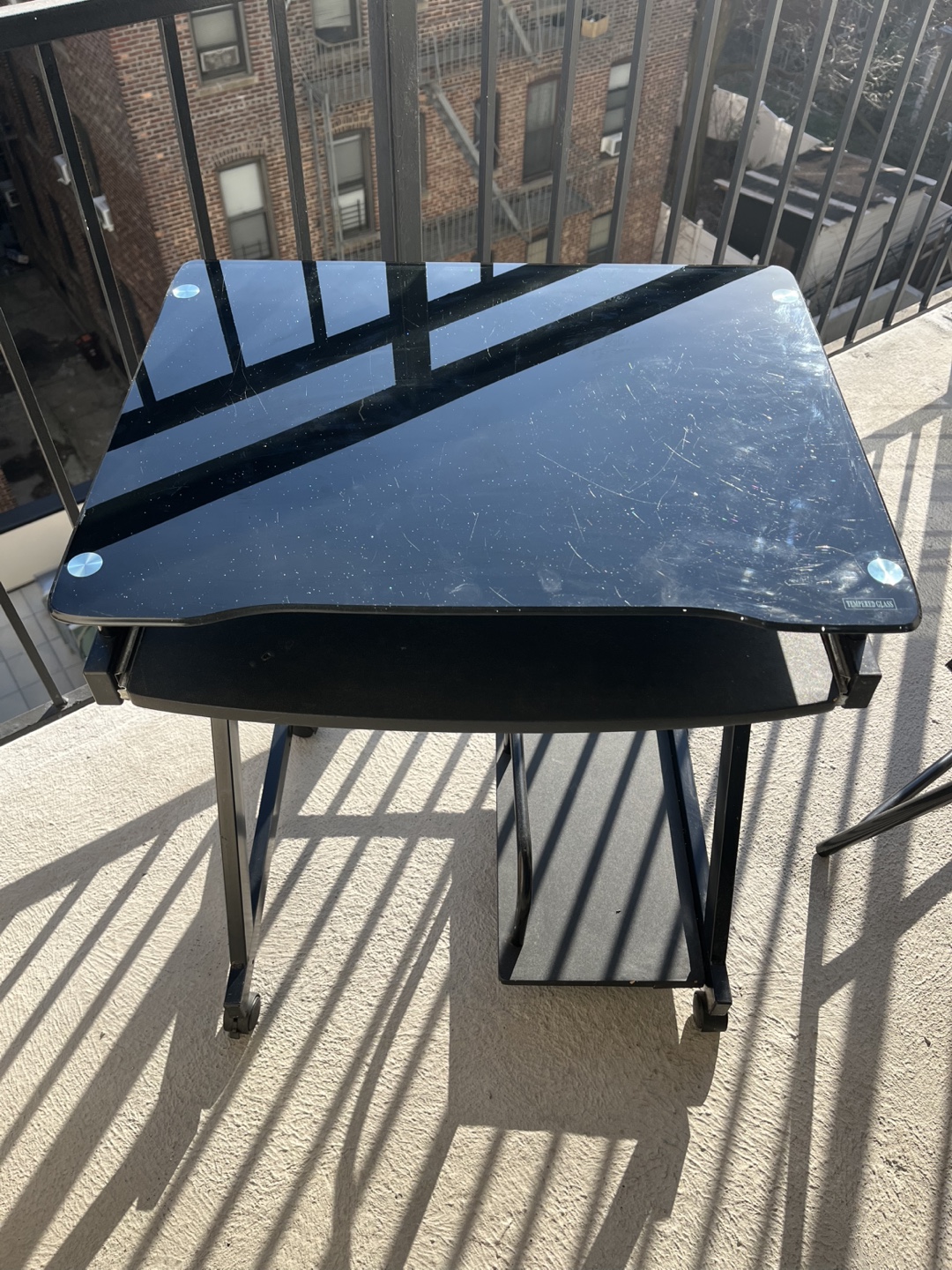 Black Glass Computer Desk with Rolling Bottom Shelf - photo 2
