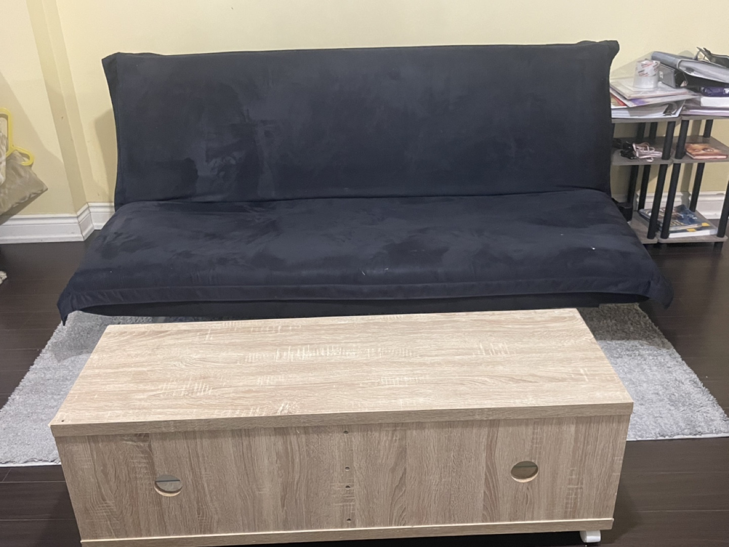A futon with a table - photo 2