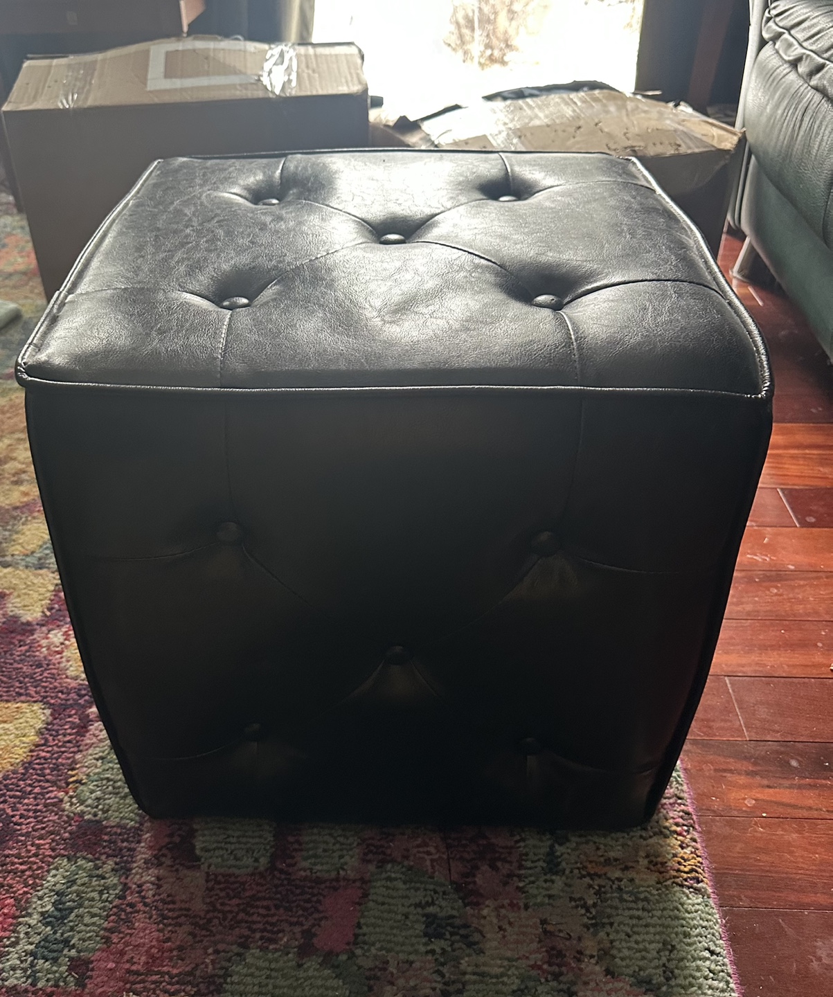 Black leather Tufted Ottoman