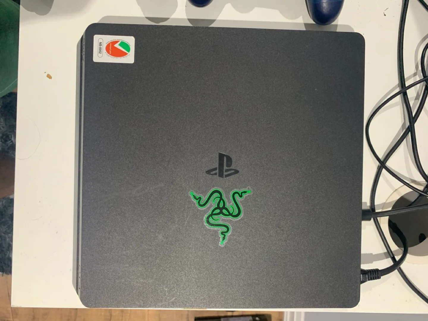 PS4 Slim with 2 Controllers, 2 games and all cables image indicator(4)