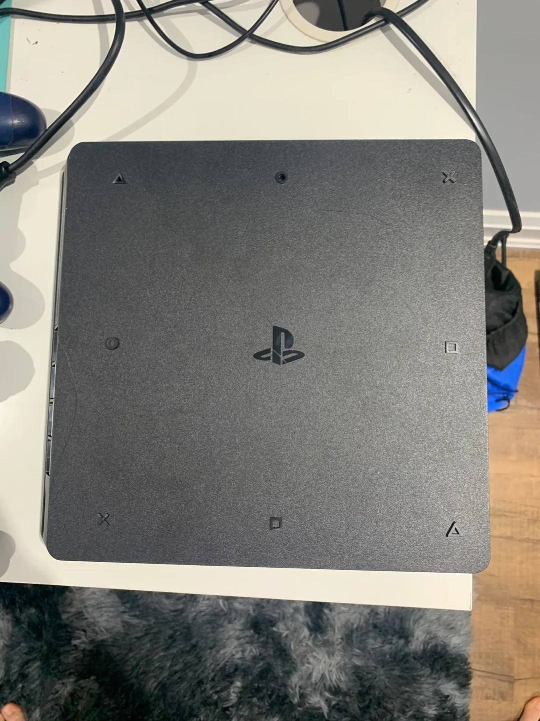PS4 Slim with 2 Controllers, 2 games and all cables image indicator(5)