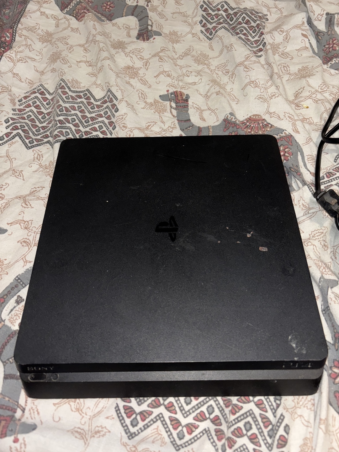 PS4 Slim Console with Two Controllers