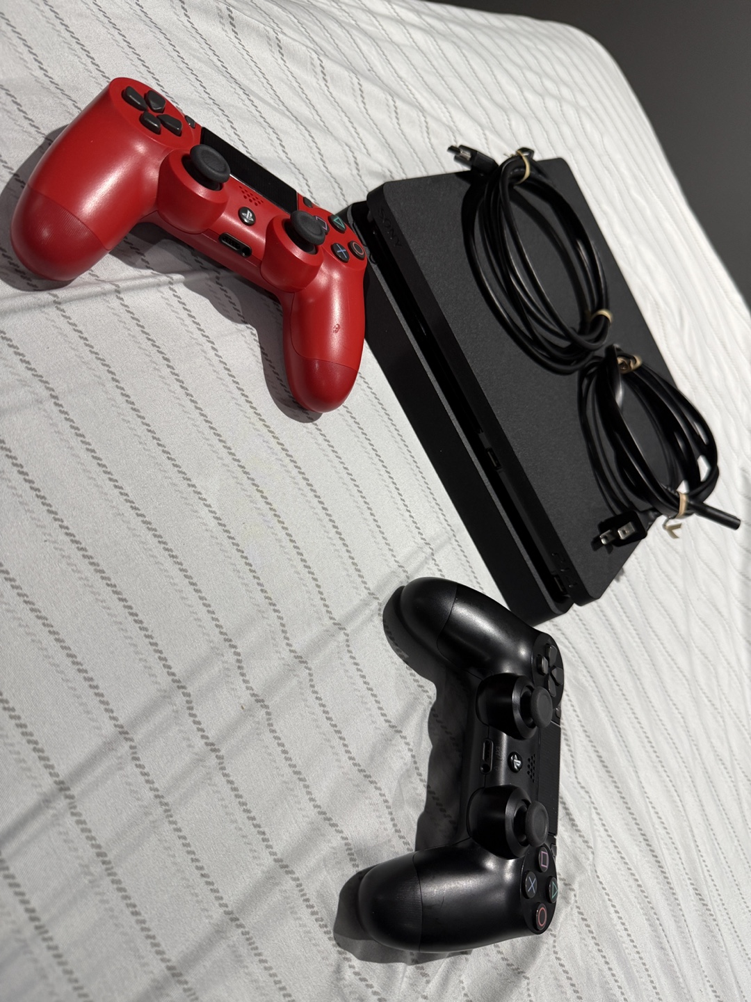 PS4 Console with 2 Controllers and 4 Games