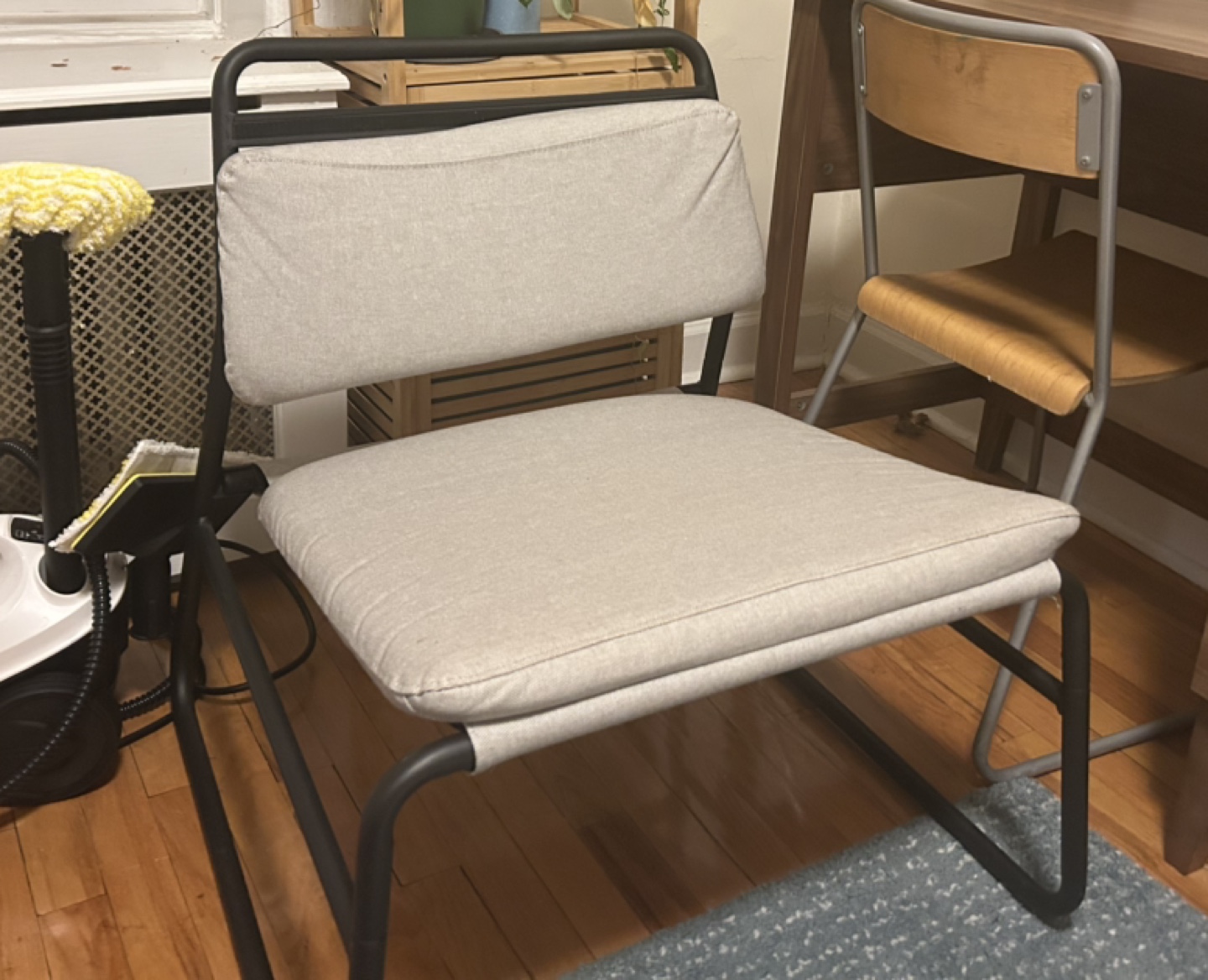 Black Metal Chair with Cushioned Seat