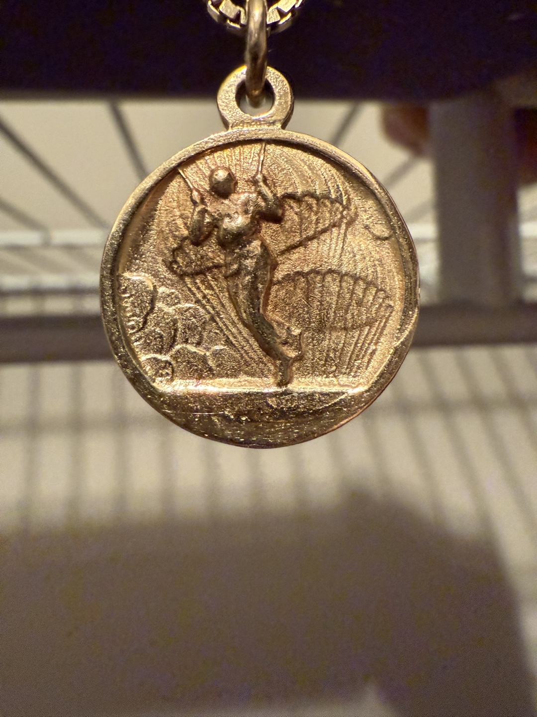 Saint Micheal & parachute man gold chain. 10k