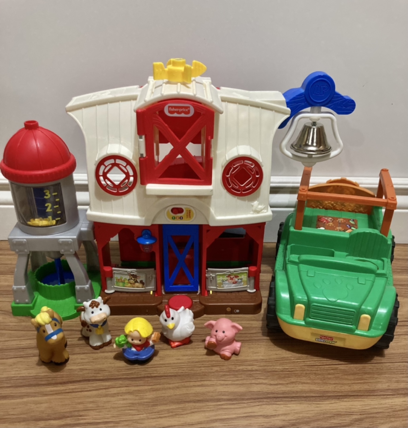 Bilingual Fisher Price Little People farm figures truck