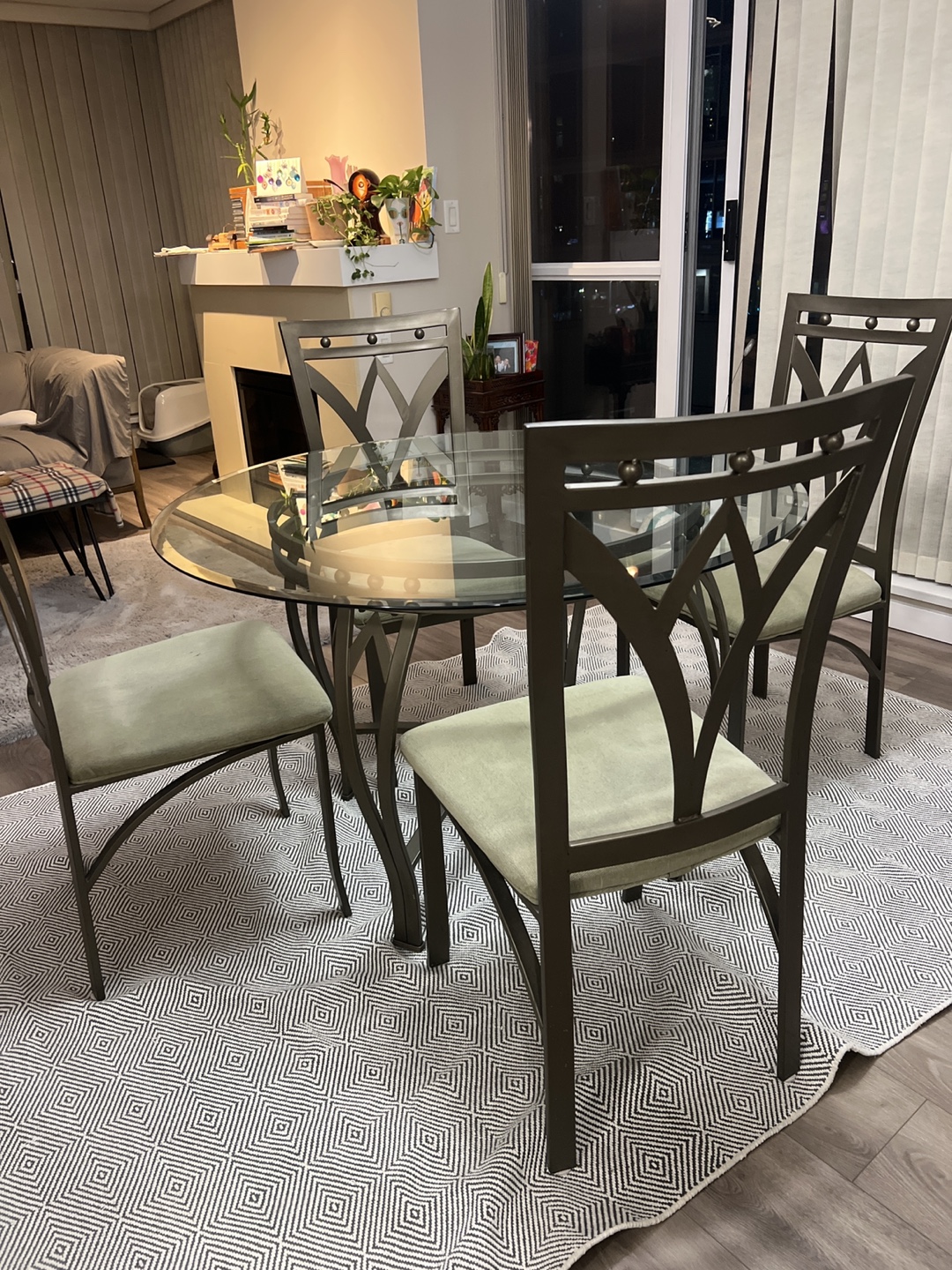 Glass dining table and four chairs
