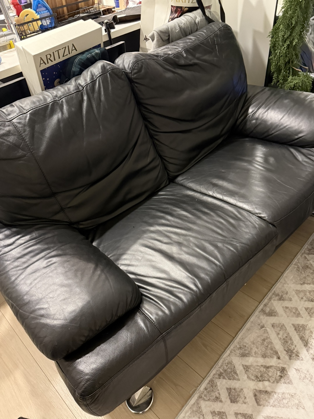 Black Leather love seat couch