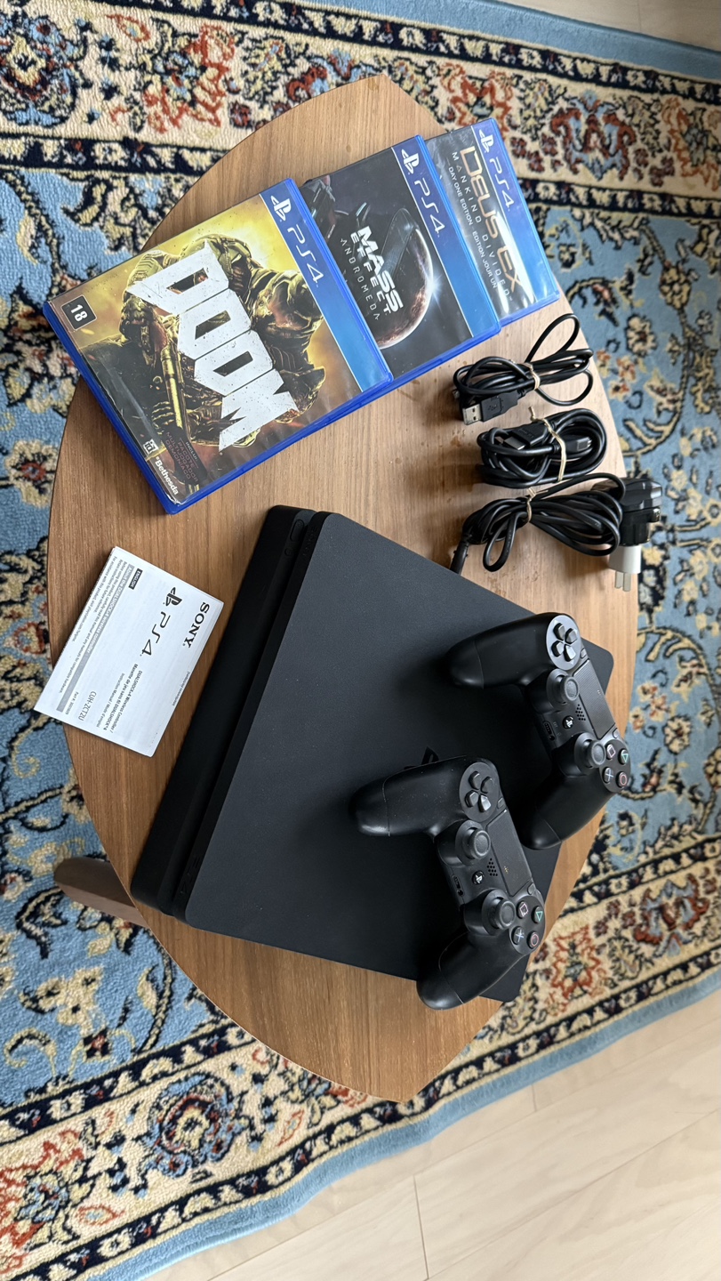PS4 Slim Console with Two Controllers and Games