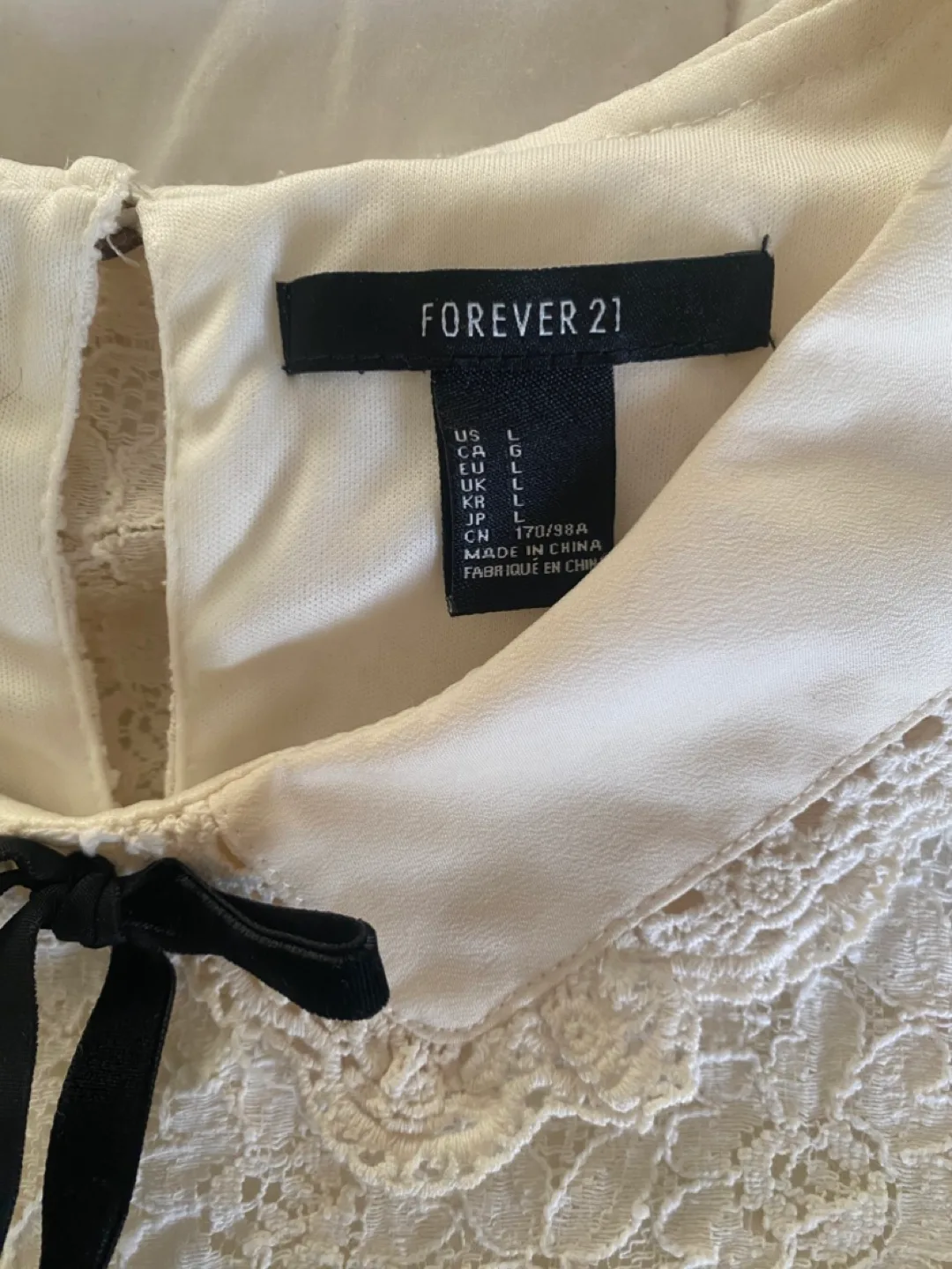 Forever 21 White Lace Dress with Black Bow image indicator(3)