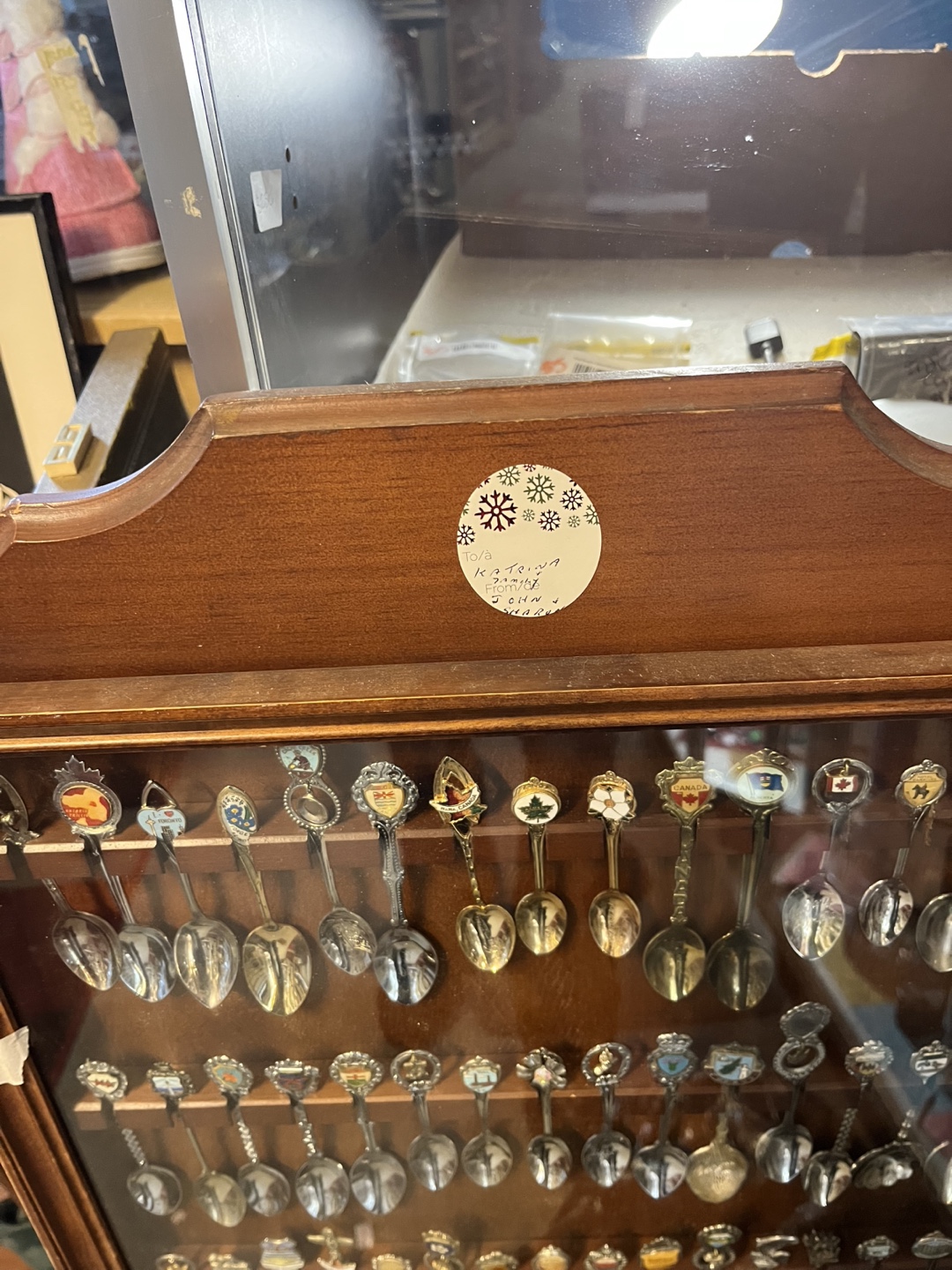 Collection of Souvenir Spoons in Display Case - photo 2