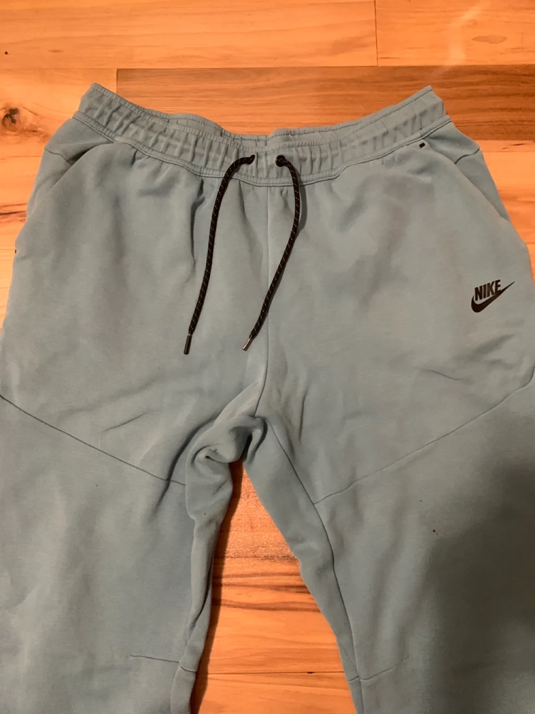 Blue nike tech pants image indicator(3)