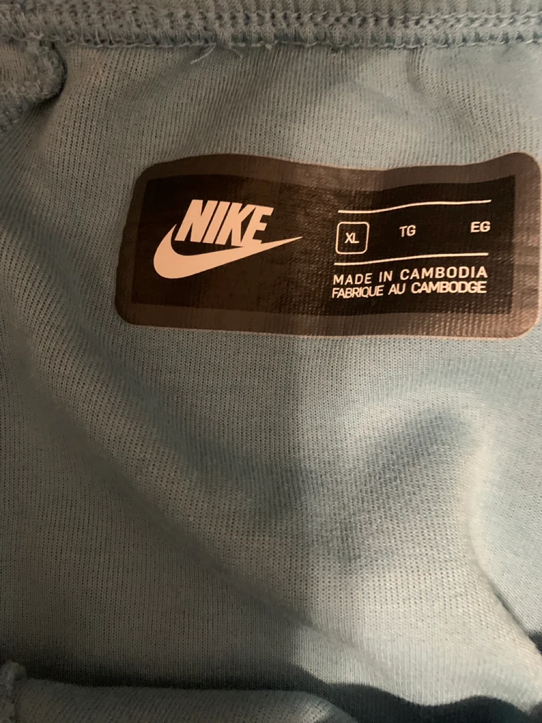 Blue nike tech pants image indicator(5)