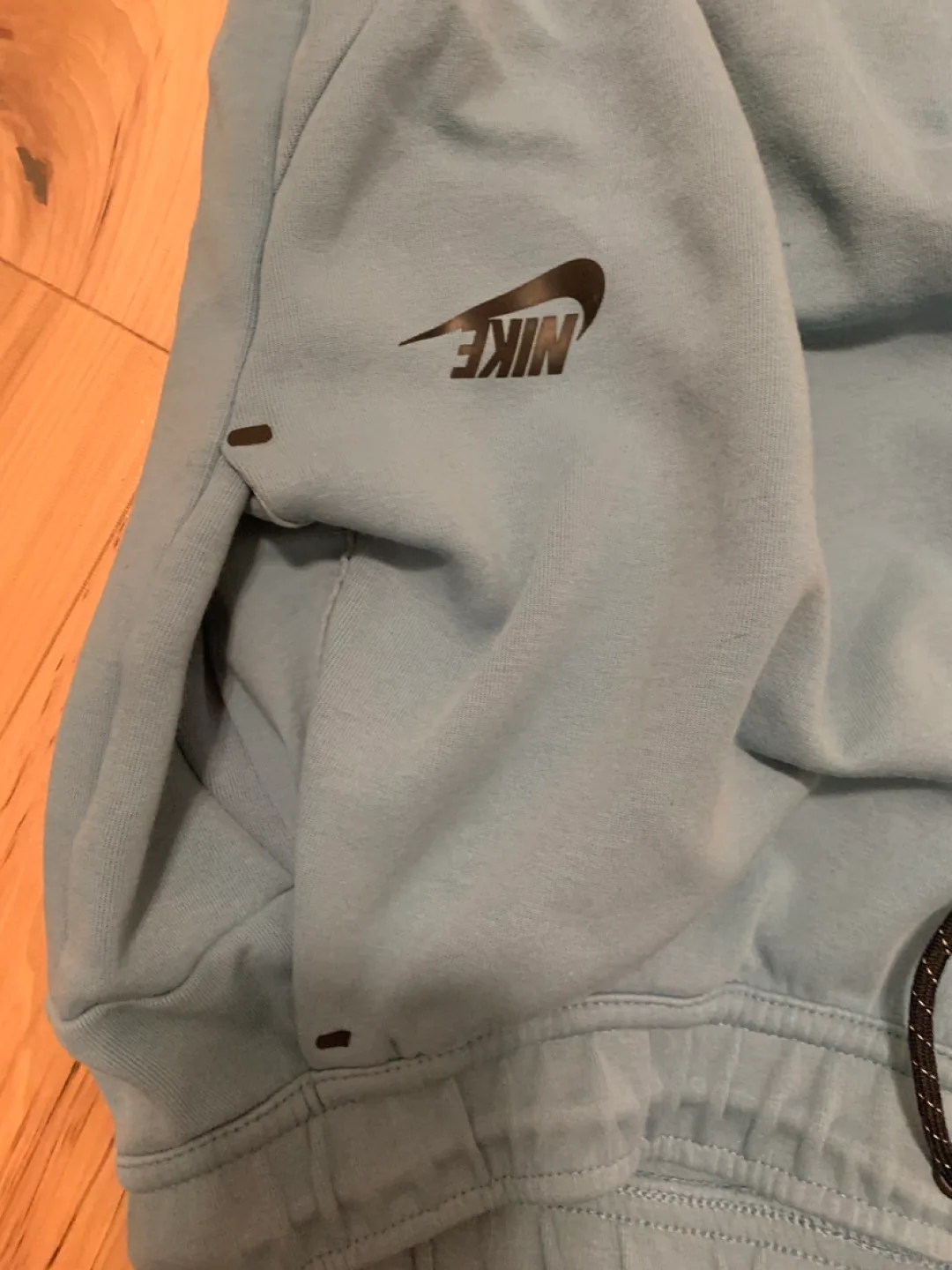 Blue nike tech pants image indicator(6)