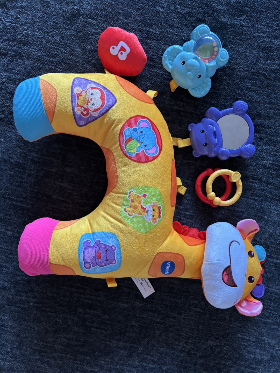Tummy time pillow with toys and rings