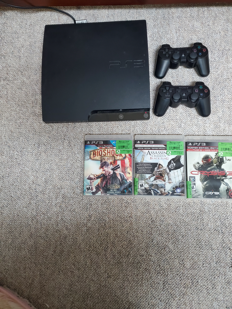 PS3 Console with Games and Controllers