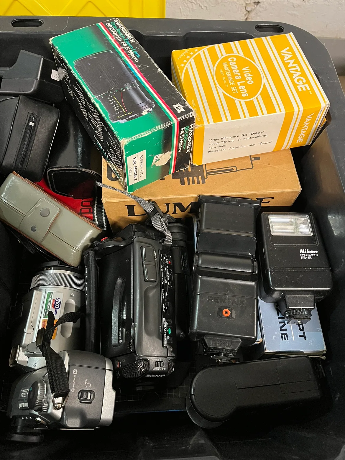 A bin full of random antique cameras and gear image indicator(2)