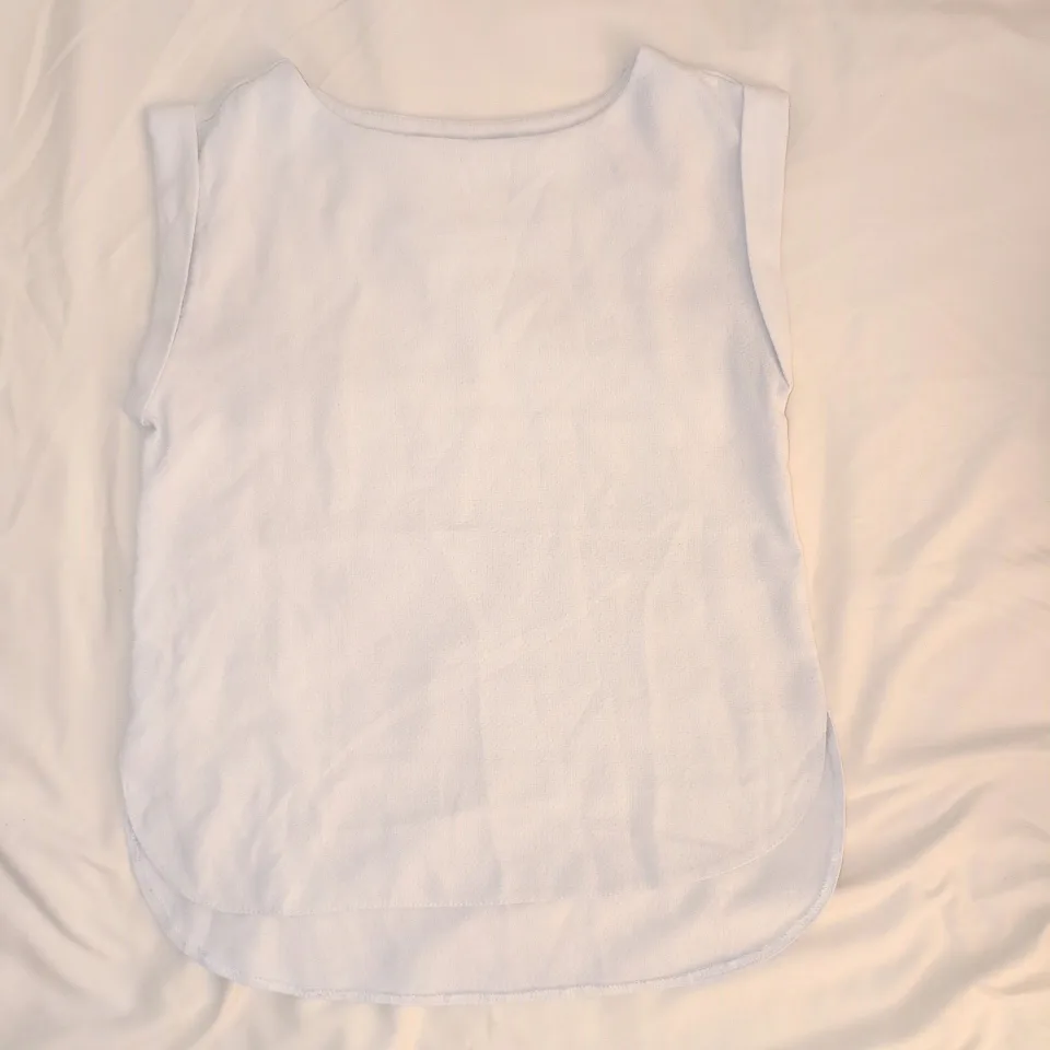 White sleeveless blouse thumbnail