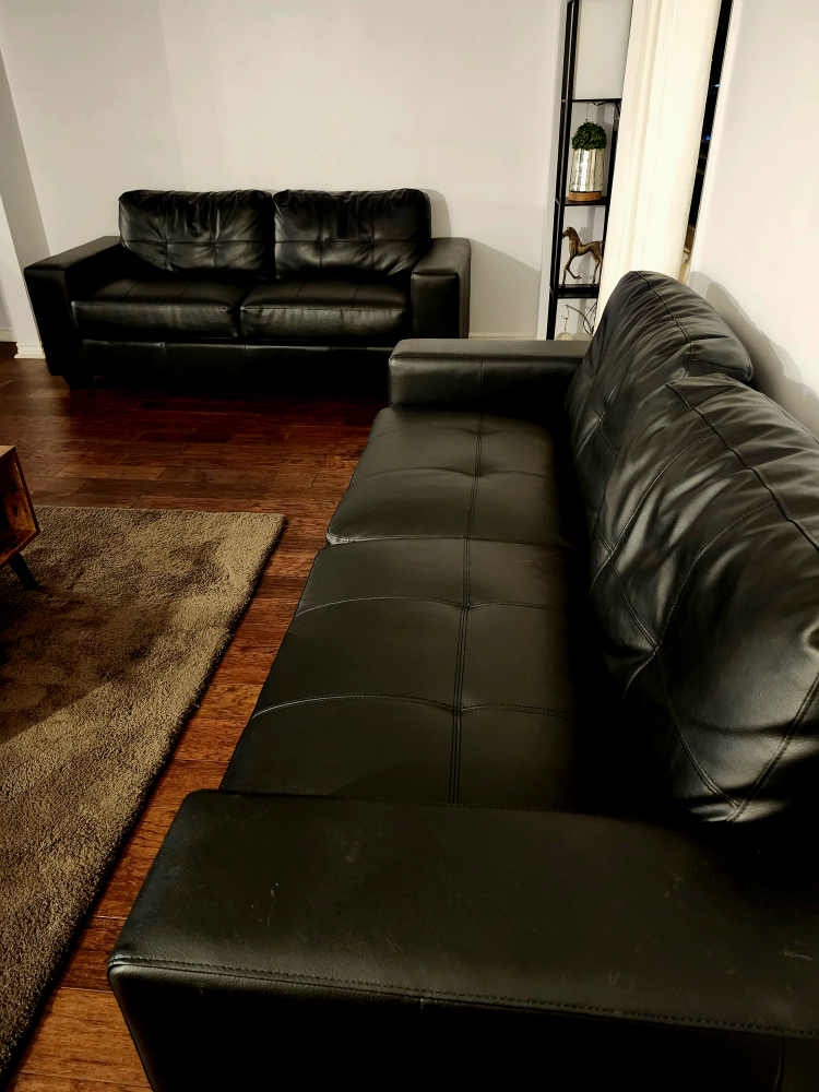2 Black Leather Sofas. Very Good condition.Both for $250
