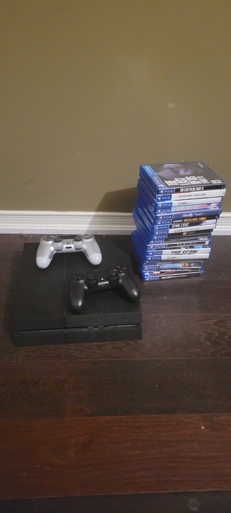 PS4 Console with Games and Controllers