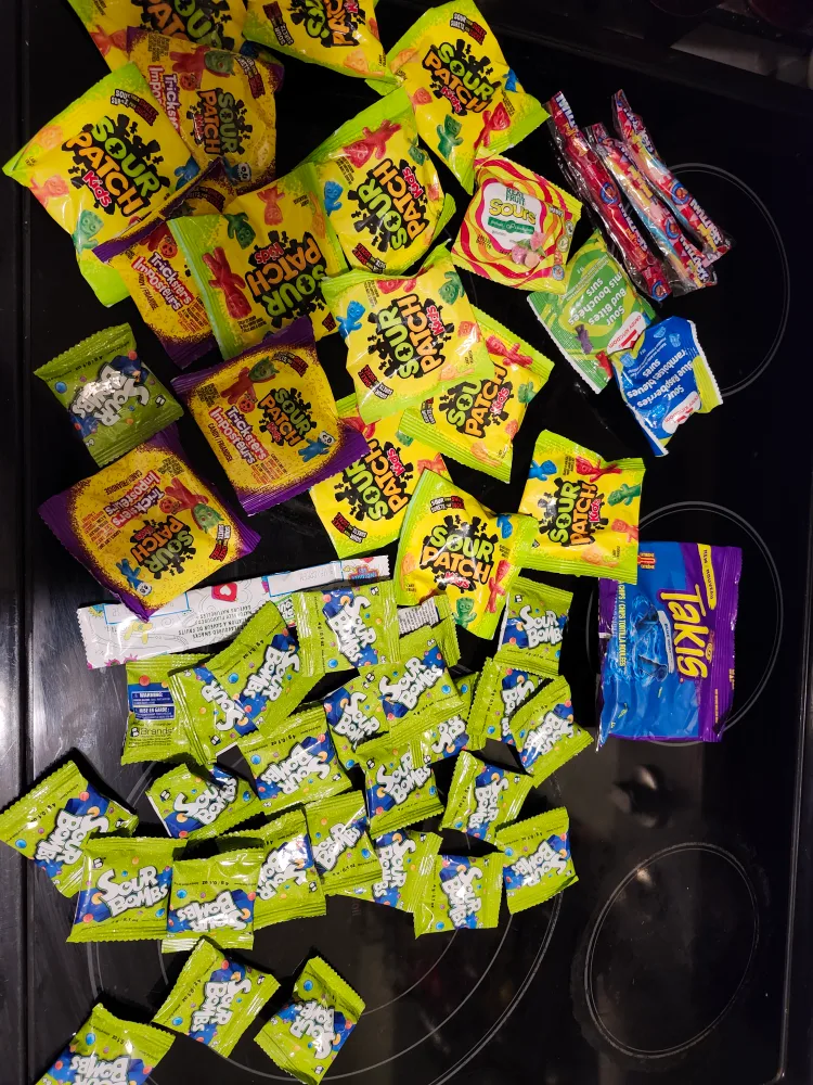sour patch, sour bomb candies and others (abt 50 pcs) thumbnail
