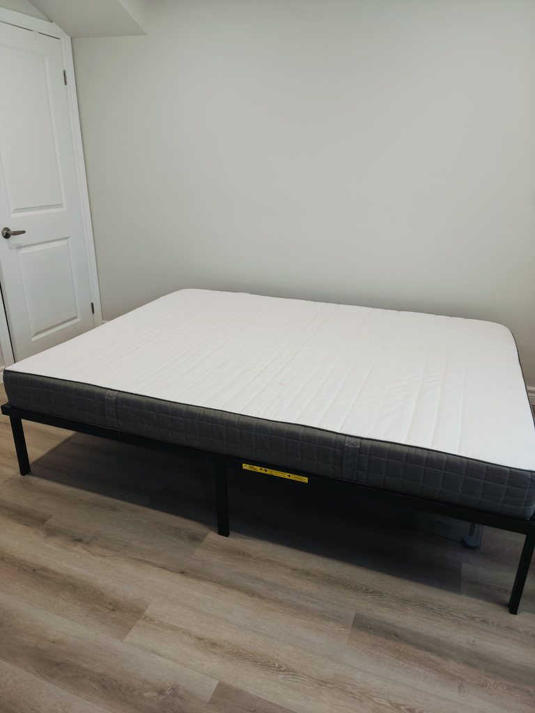 IKEA SONGESAND Queen sized Bed Frame with Mattress. Less used.
