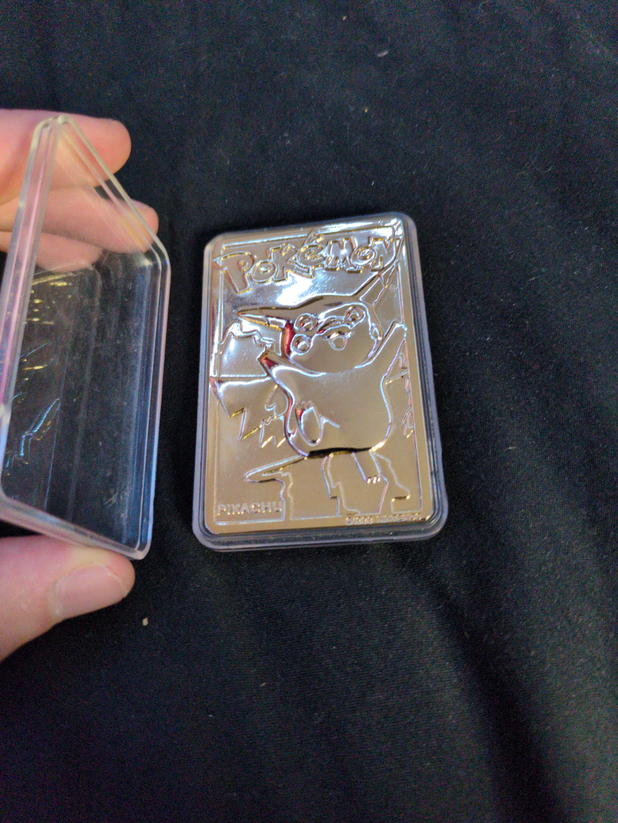 gold plated metal Pikachu card