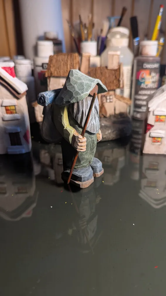 Dan Reiger.         Hand-carved wooden gnome figurine